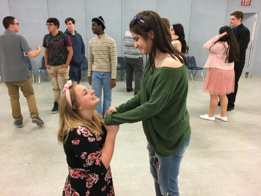 [Pictured: Improv Troupe Board Member Mattie Daniels (right) and favored candidate to succeed her position following graduation, Jodi Cesare (left).]