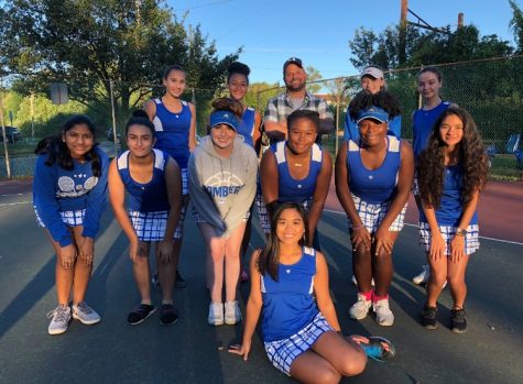 Girls varsity tennis remain white division champions